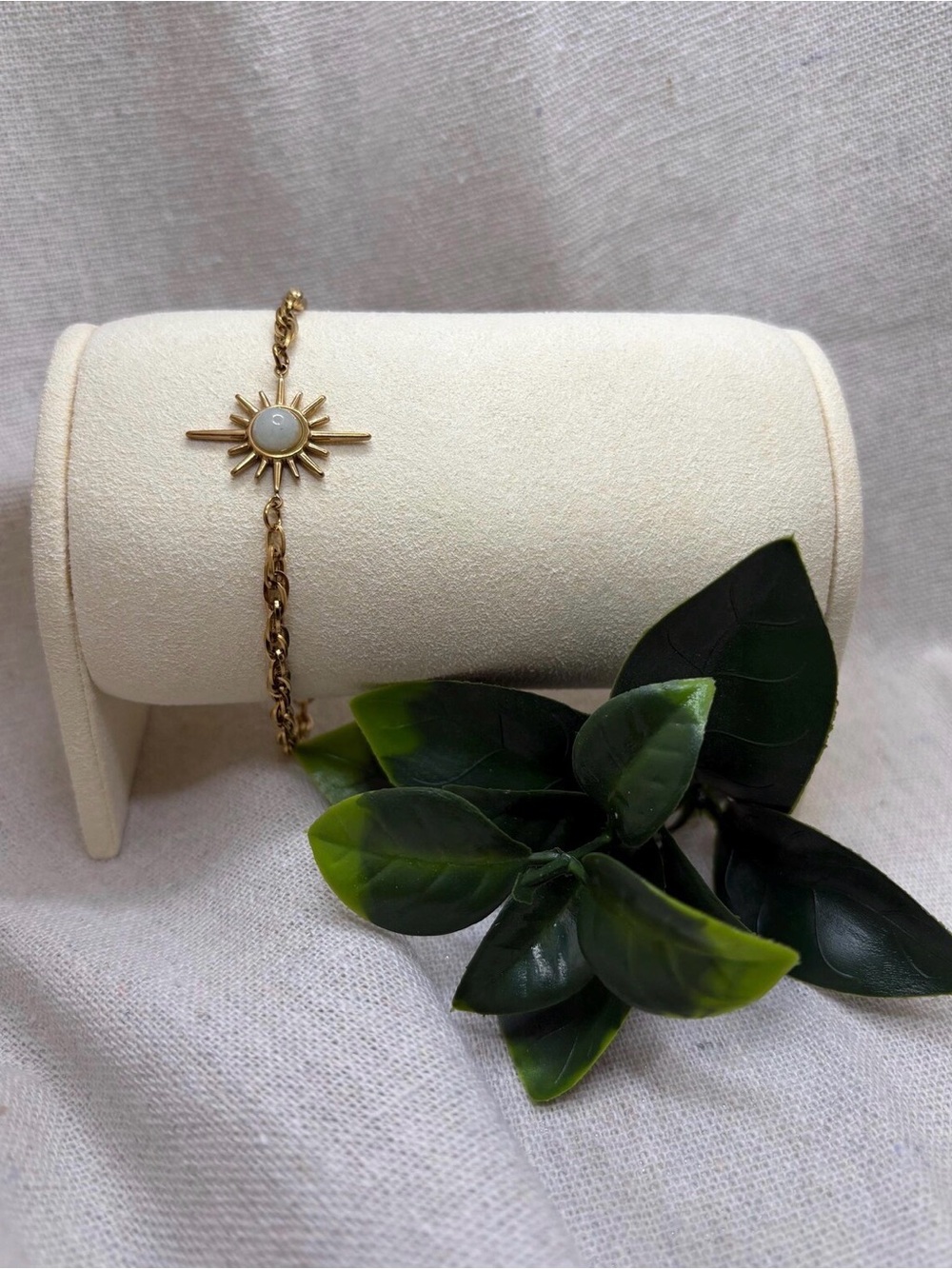 Gold Sunburst Chain Bracelet with White Center Stone